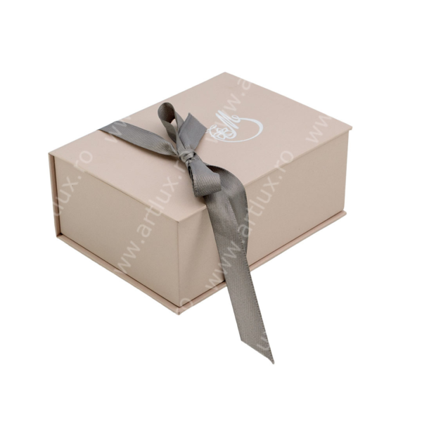Beige gift box tied with a gray ribbon in a bow on top side view